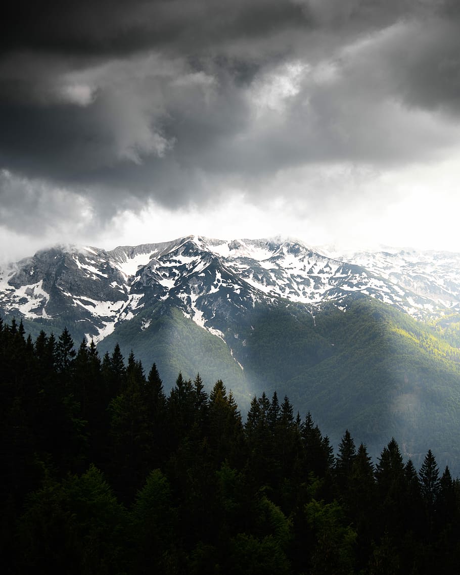 birds eye view of mountains and cloudy sky, snow coated mountain during daytime HD wallpaper