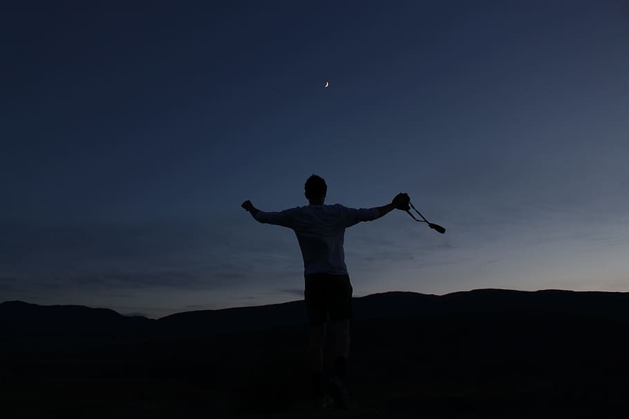 silhouette of man jumping up, silhouette of man during night time HD wallpaper