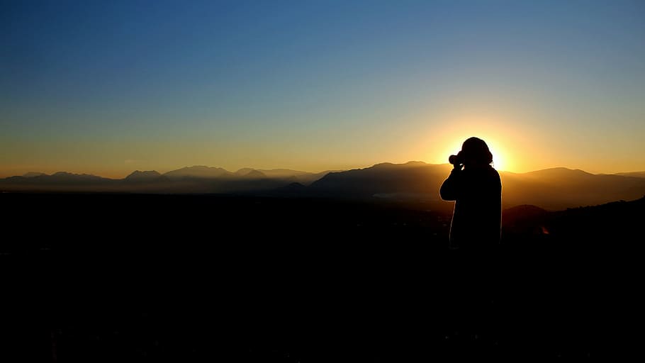 silhouette photo of person holding camera, photographer, photography