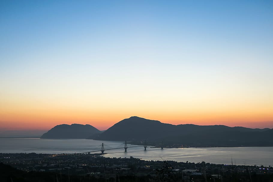 silhouette of buildings and sea, aerial, photography, golden HD wallpaper