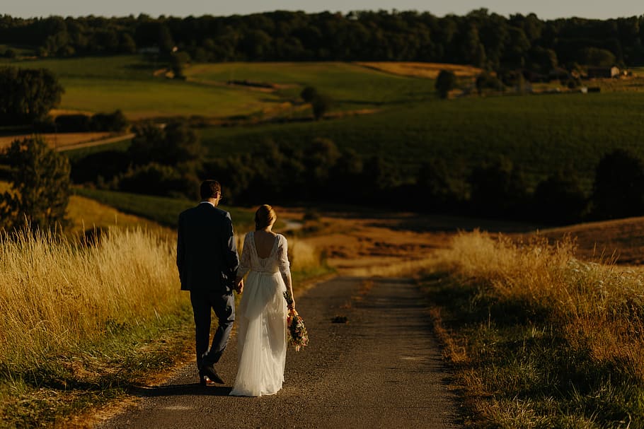 couple walking on a concrete road photo, woman, bride, groom