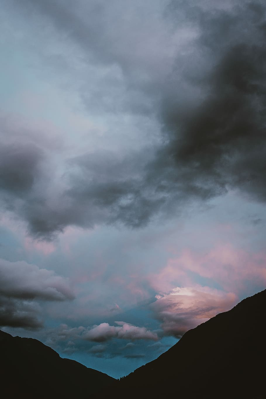 silhouette photography of mountains under nimbus clouds, silhouette photography of hill under gray clouds HD wallpaper