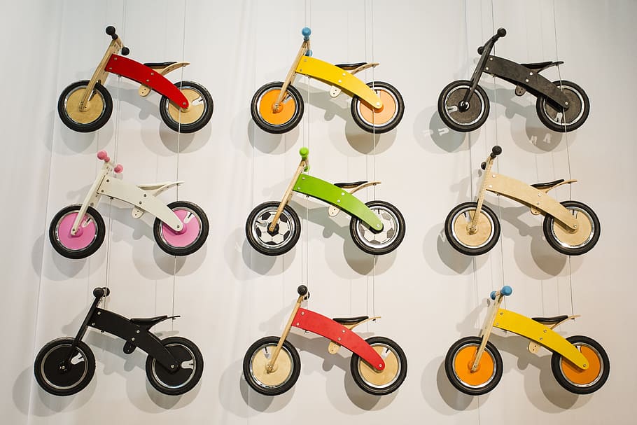 nine assorted-color balance bike miniatures, impeller, wheels HD wallpaper