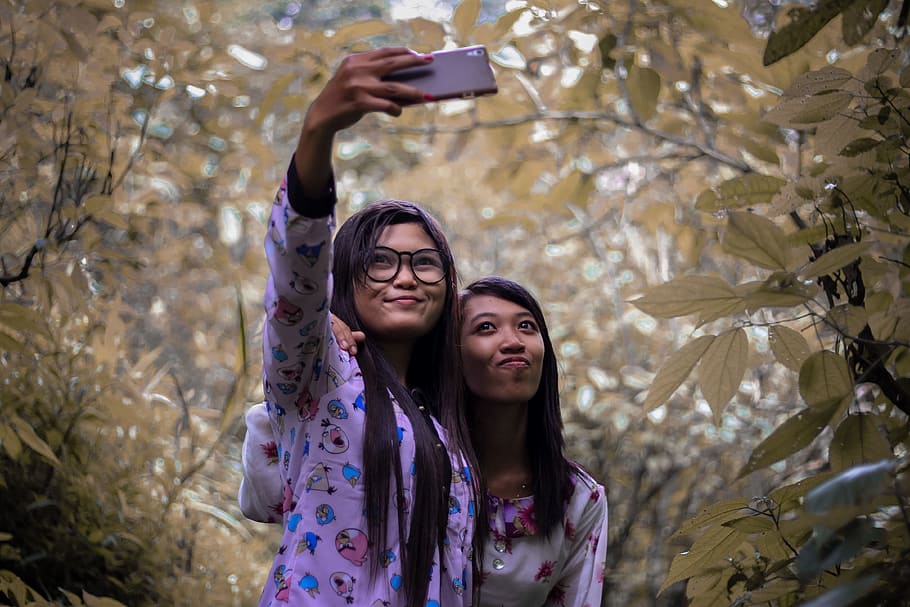 two women taking picture outdoors, Girl, Leaf, Photo, selfi HD wallpaper