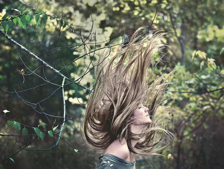 woman with blonde long hair flipping her hair near trees, women HD wallpaper