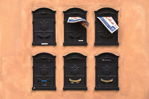 six black wooden frames, six black mail posts, mailbox, paper HD wallpaper