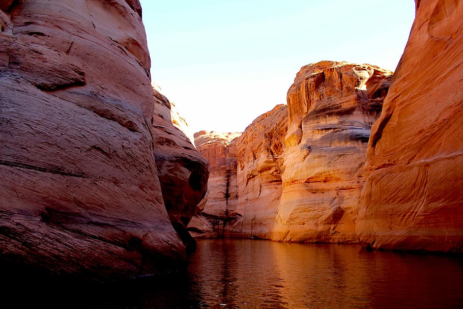 body of water beside rock mountain, Grand Canyon taken during daytime HD wallpaper