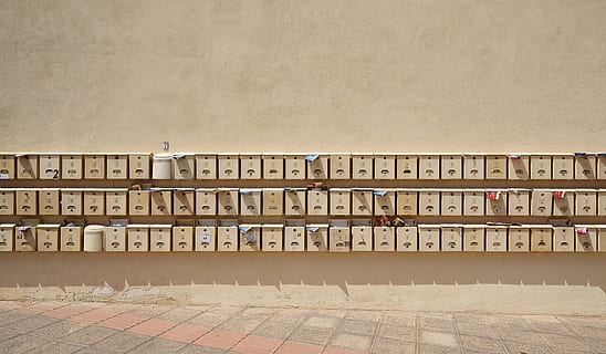 piled brown wall-mount mailboxes, wooden box, lot, post, letter boxes HD wallpaper