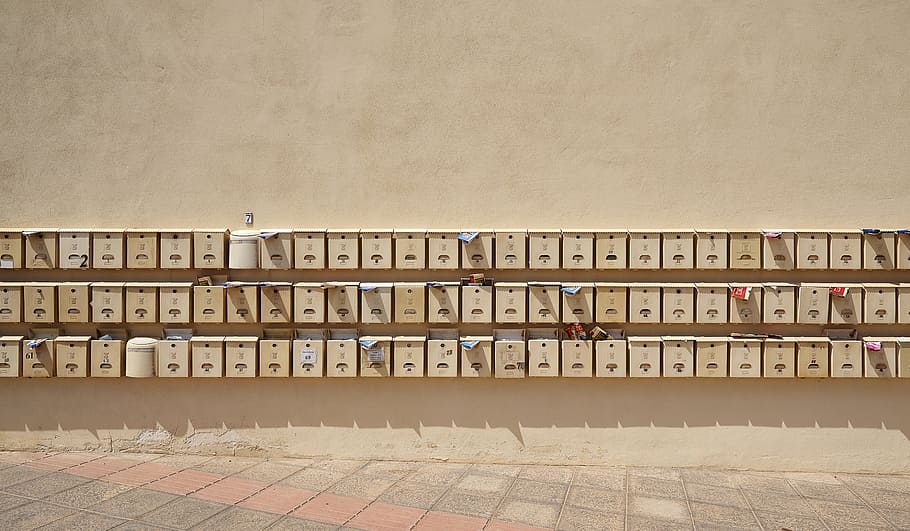 piled brown wall-mount mailboxes, wooden box, lot, post, letter boxes HD wallpaper
