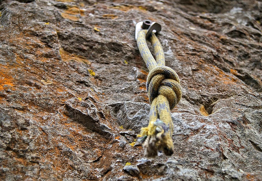 yellow and black rope hanged on gray rock, knot, climbing, tight HD wallpaper