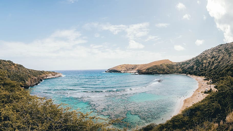 landscape photography of coastline, blue lagoon taken at daytime HD wallpaper