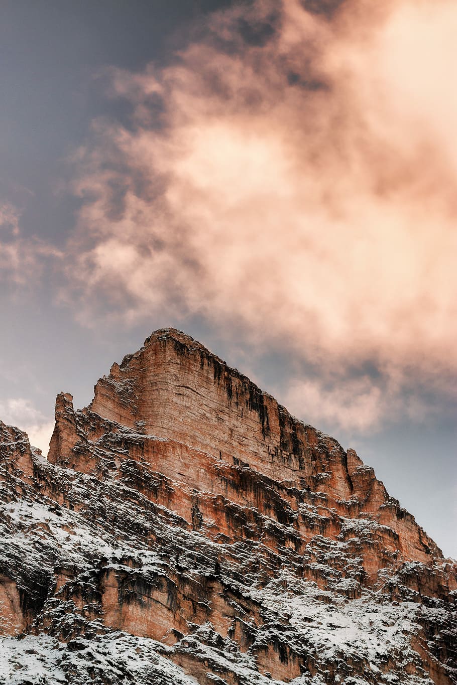 brown rock mountain under white clouds at daytime, low angle photography of outcrop HD wallpaper