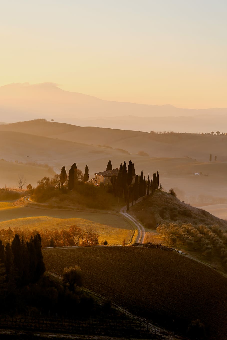 village under clear sky, photo of concrete house near plain fields during golden hour HD wallpaper