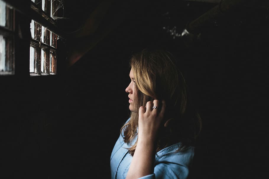 woman in blue dress shirt near window glass, women, people, sadness HD wallpaper