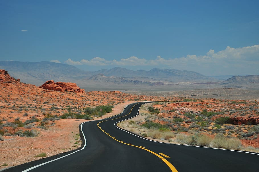 asphalt road in middle of land, black, surrounded, dessert HD wallpaper