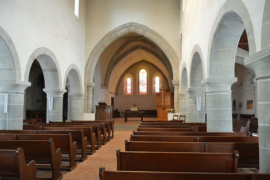 church, benches, rows of benches, plenty of natural light, gothic style