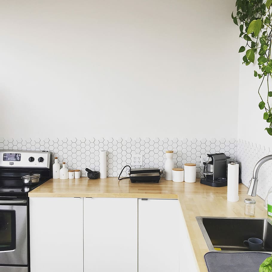 black coffee maker on brown wooden kitchen table, faucet turned off near glass bottle HD wallpaper