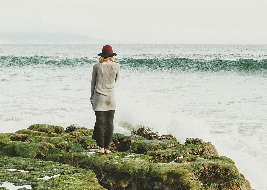 woman standing on rock on seashore, men, one Person, outdoors HD wallpaper