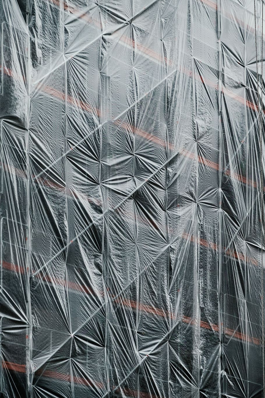 black and red fabric sheet, photo of gray tarpaulin covered building HD wallpaper