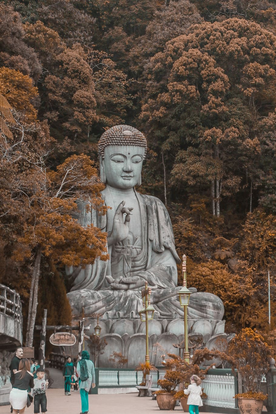 people walking near buddha statue near trees at daytime, people near gray Buddha statue HD wallpaper