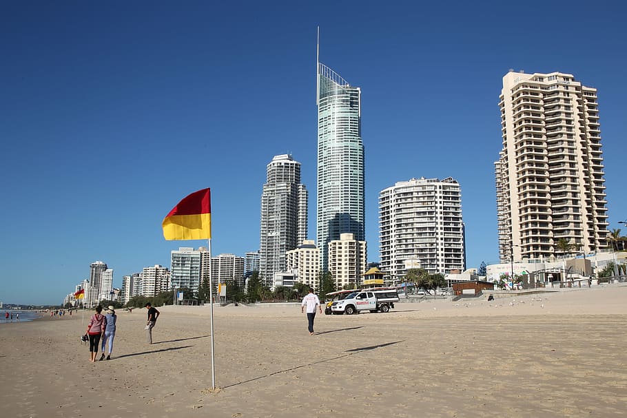 people walking near the flag during daytime, surfers paradise, HD wallpaper