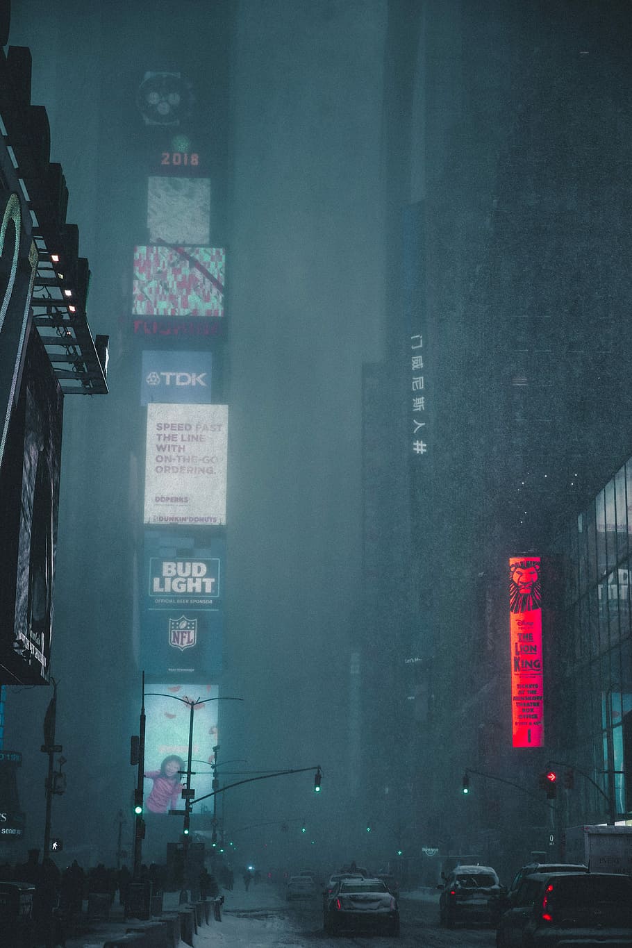vehicles on road during night time, cityscape covered with fog HD wallpaper