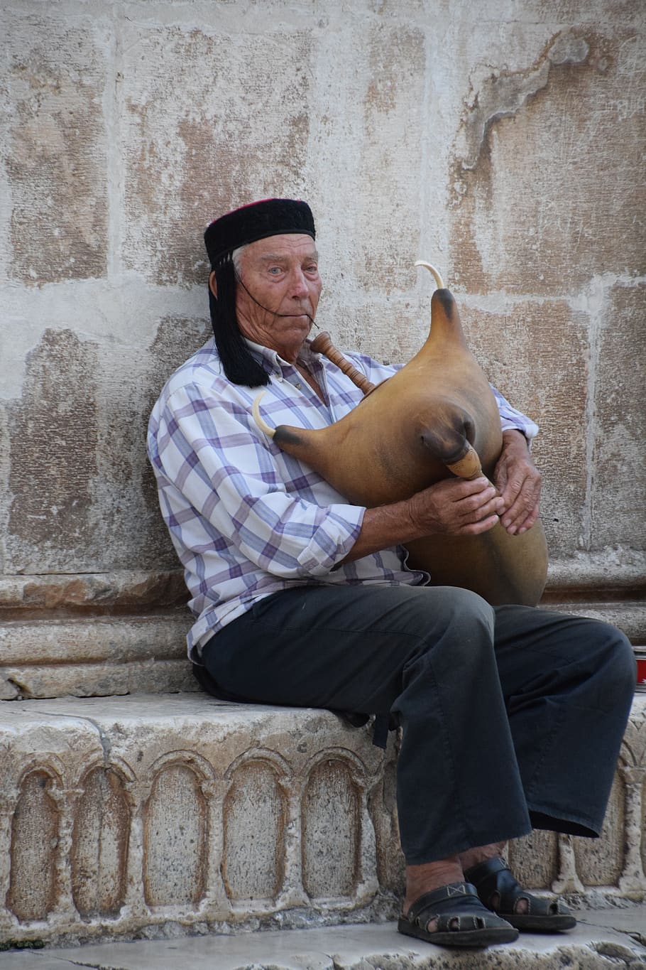 bagpipe, man, croatia, sitting, real people, one animal, mammal HD wallpaper