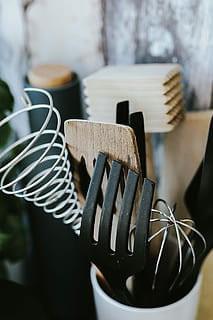 Kitchen utensils and cans by the wall, containers, cooking, spoon HD wallpaper
