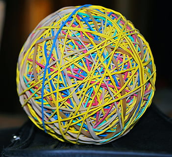 yellow and brown rubberband ball, game, white, orange, red HD wallpaper