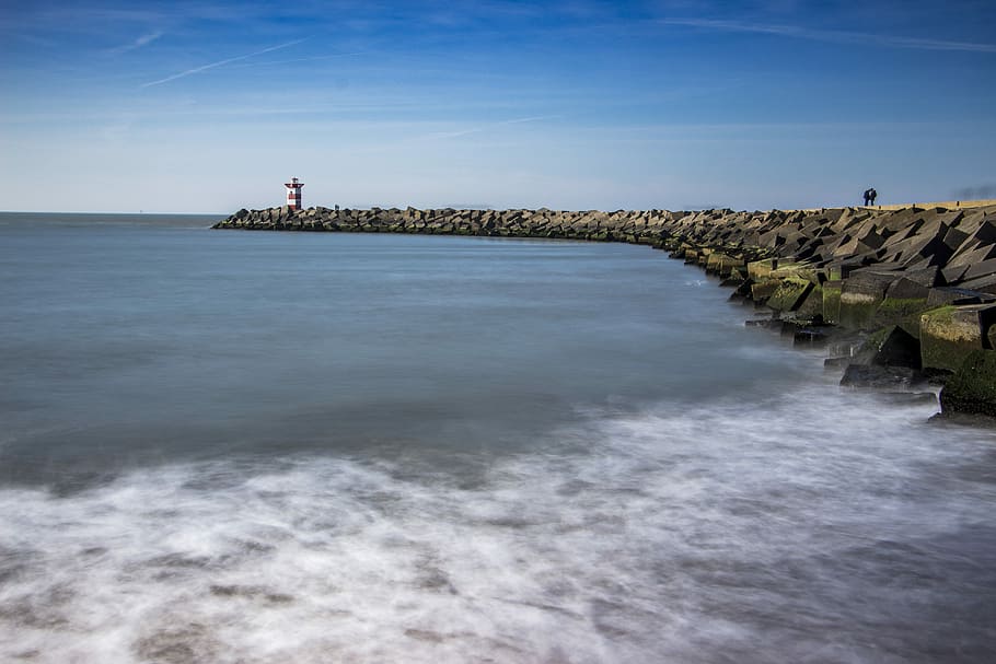lighthouse near body of water, body of water, sea, stone, rocks, HD wallpaper