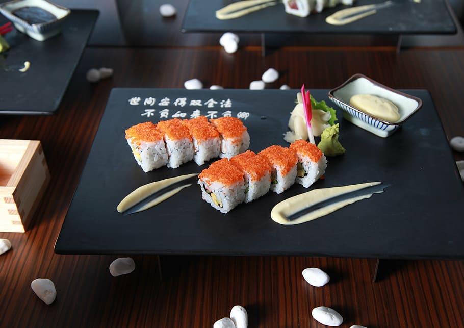 sushi served on black plate, maki roll, j, japanese, healthy