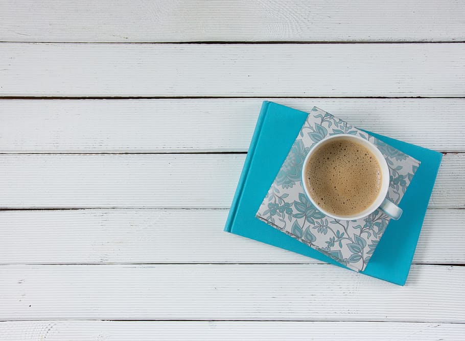 white ceramic mug on white and blue floral matt, coffee, notebook HD wallpaper