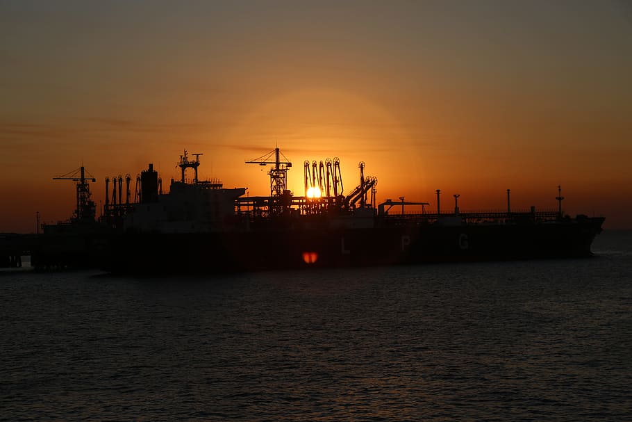 silhouette of ship, sunset, industry, sea, water, energy, sky HD wallpaper