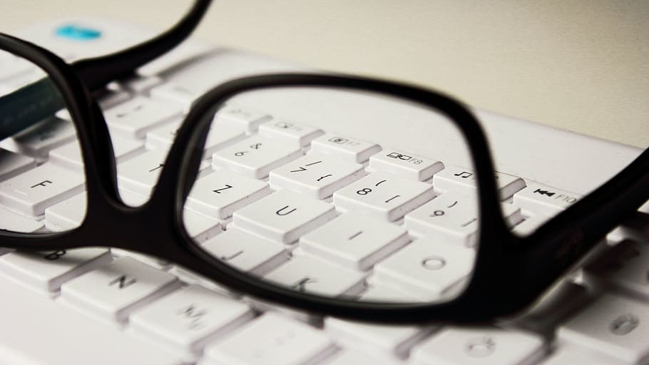 black framed eyeglasses and white comptuer keyboard, workplace HD wallpaper