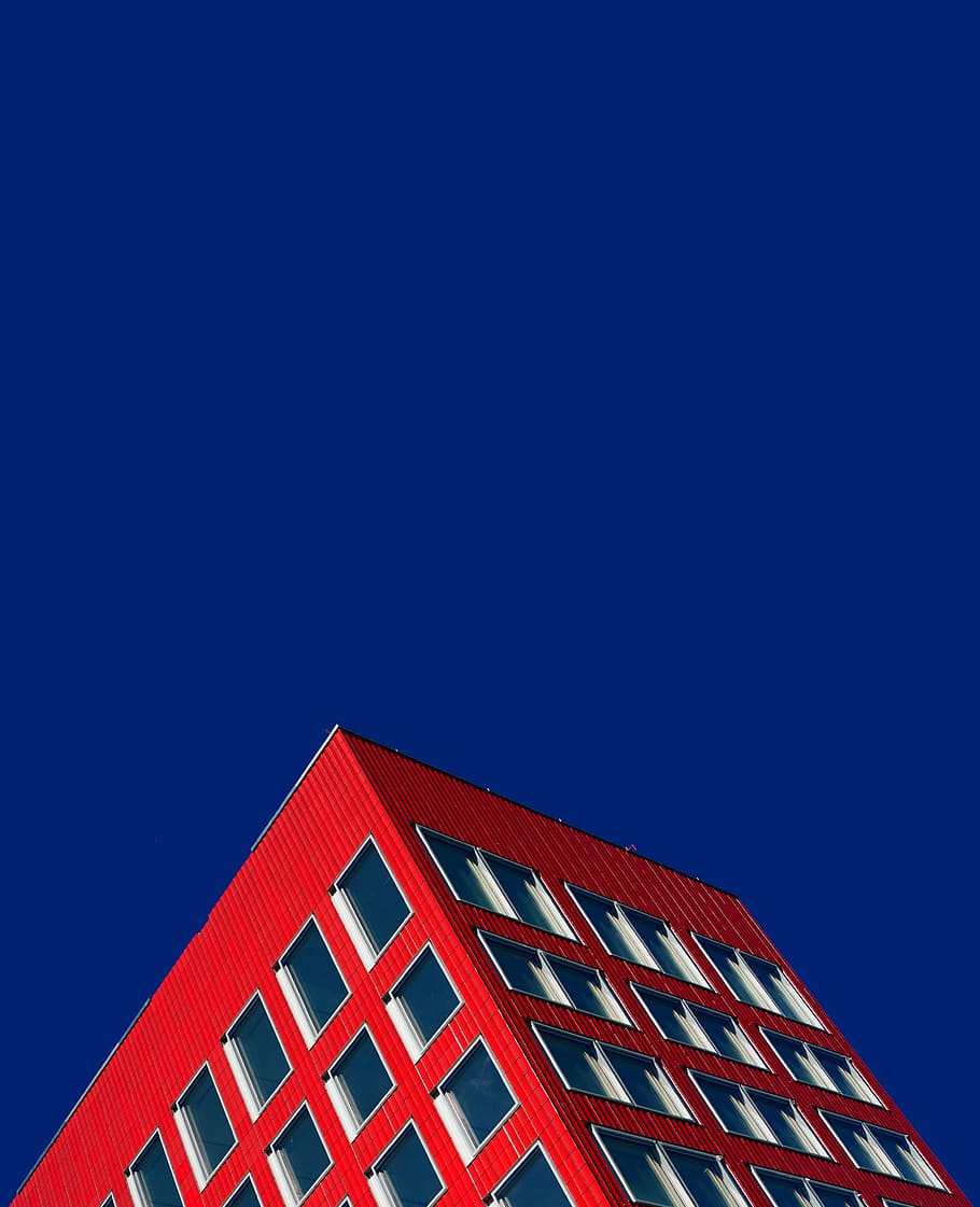 worm's eyeview of red building, red high-rise building under blue sky HD wallpaper