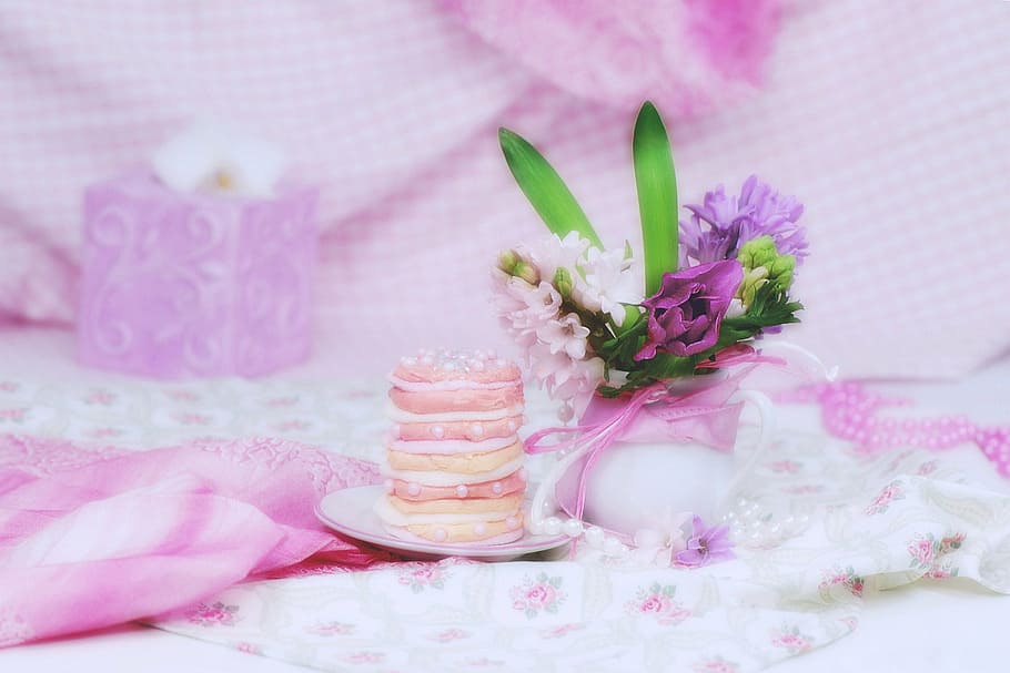 white and purple petaled flowers and round macaroons, eat, drink