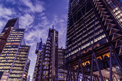 Wide-angle shot taken at dusk in the financial district of London HD wallpaper