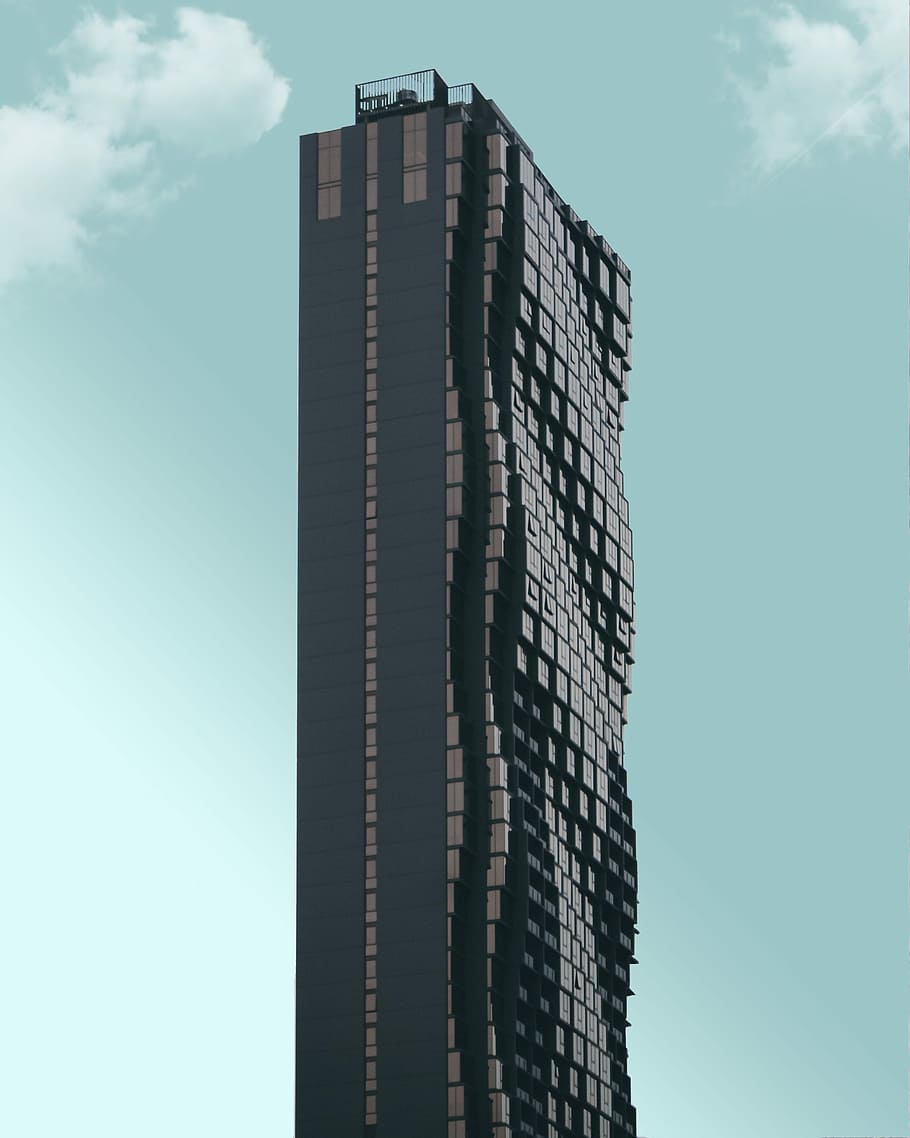 black high-rise building during daytime, photo of black and gray curved high-rise building HD wallpaper