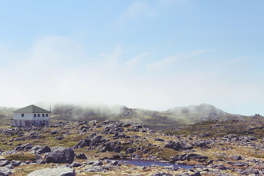 white concrete house on mountain under gray sky, storey, blue HD wallpaper