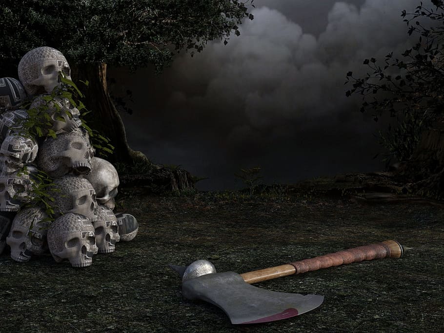 brown handled axe on ground beside gray human skulls, tree, weird