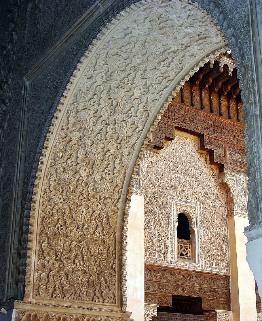 gray concrete arch, morocco, marrakech, decoration, arabesques