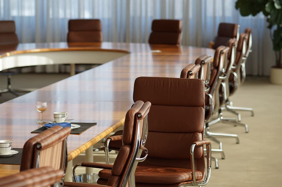 silver and brown leather padded rolling chairs in front of brown table HD wallpaper