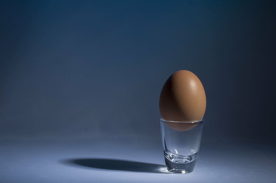 brown egg on top of clear shot glass, food, chicken egg, food and drink, HD wallpaper