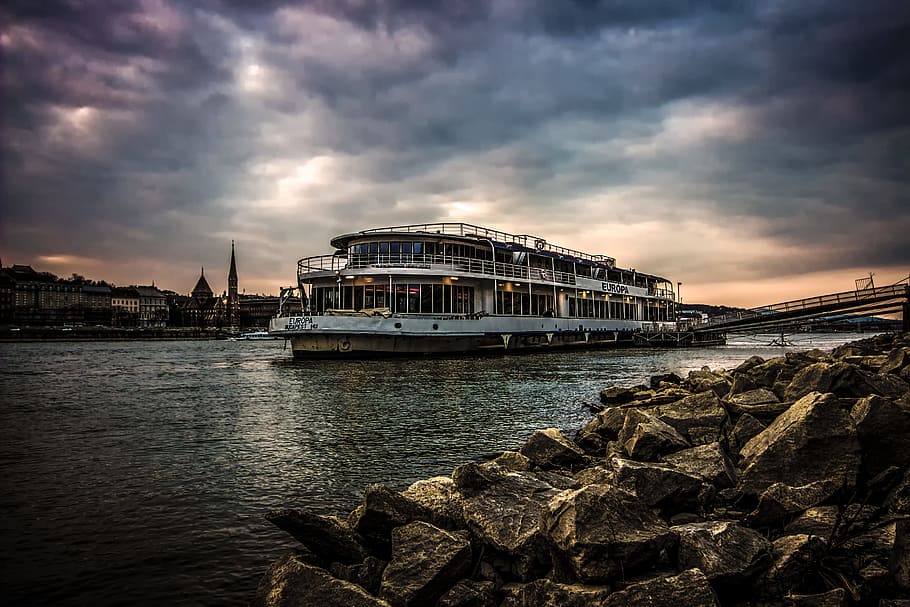 White Ferry Boat by Rocky Shore, Budapest, city, cityscape, clouds HD wallpaper