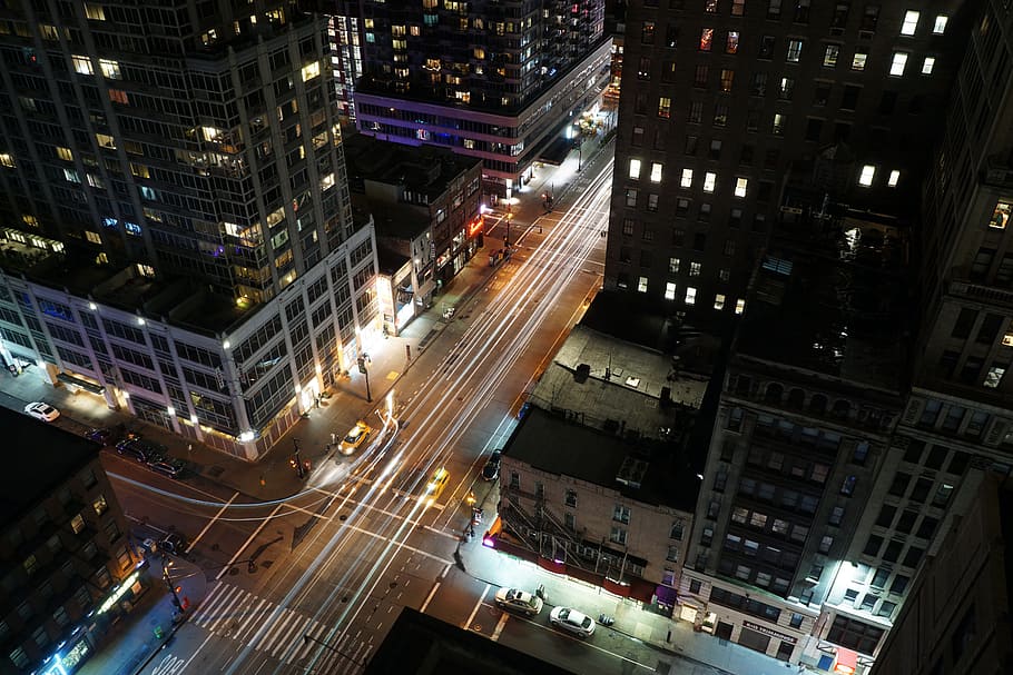 timelapse photograph of street and concrete structures, timelapsed photo of a lighted city HD wallpaper