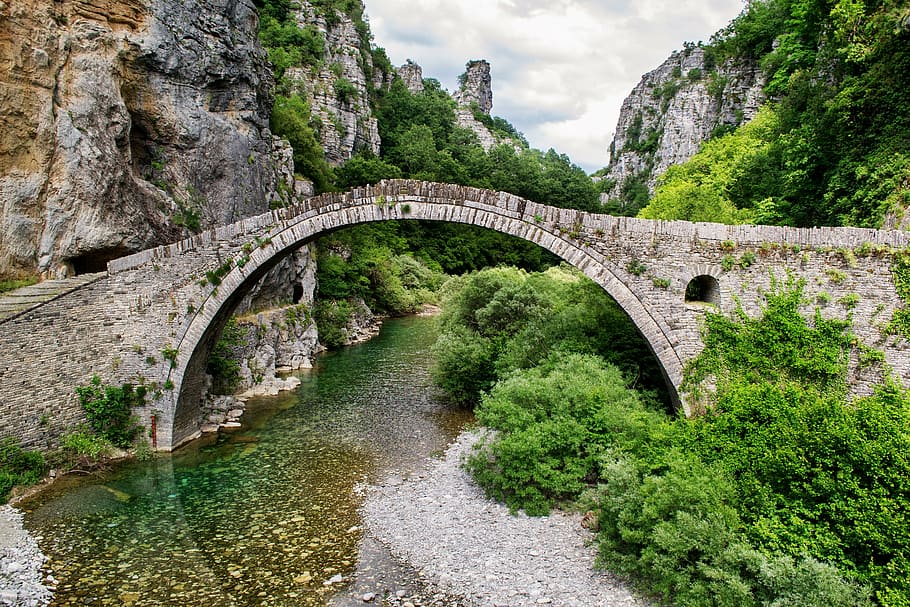 arch bridge surrounded by trees, beautiful landscape, greece