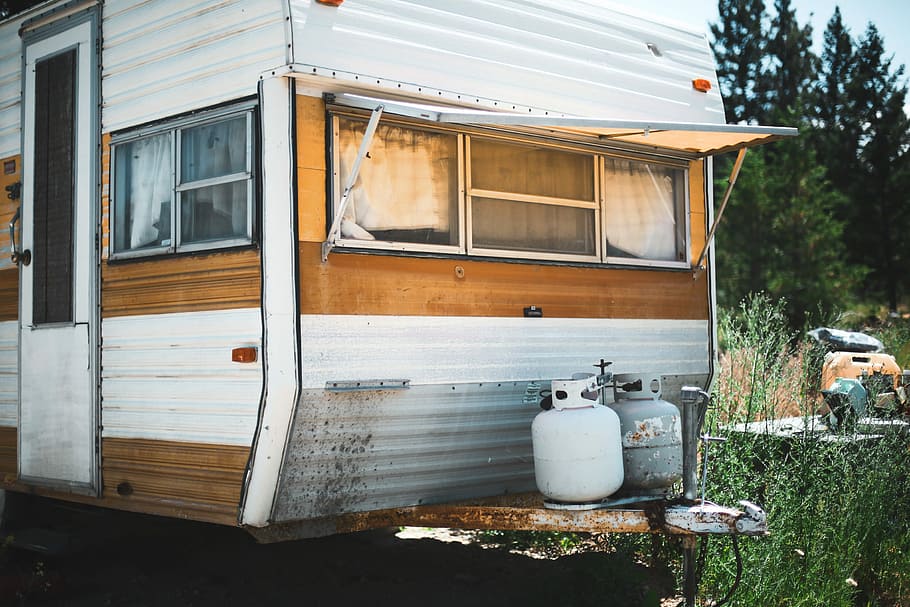white and gray propane gas tanks on RV trailer, two gray gas cylinders beside white and brown travel trailer HD wallpaper