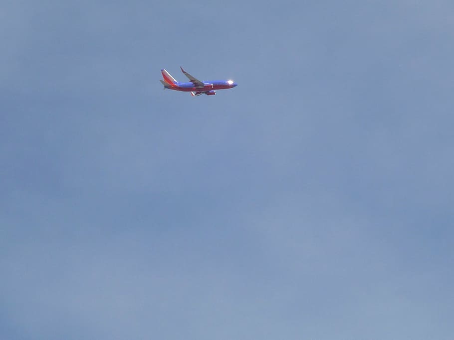 airplane, clouds, sky, flying, blue, transportation, red, travel HD wallpaper
