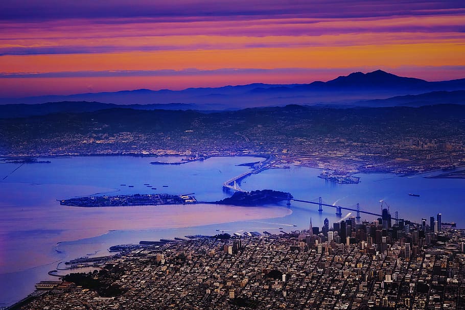 aerial photography of high rise building during golden hour, city buildings and bridge during sunset aerial photography HD wallpaper
