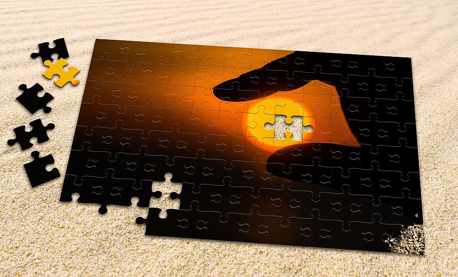puzzle, sun, sand, hand, evening sun, sunset, background image HD wallpaper
